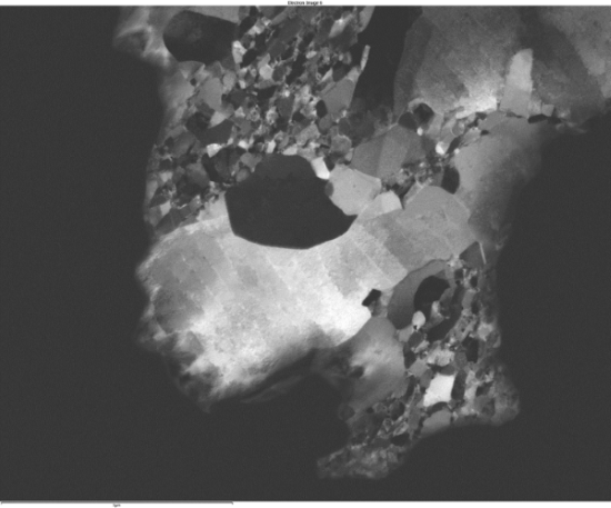 Oriented darkfield image of a fatigued copper sample showing nanocrystalline grains and dislocation arrays