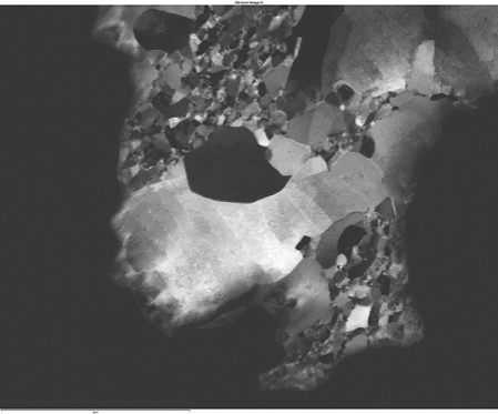 Oriented darkfield image of a fatigued copper sample showing nanocrystalline grains and dislocation arrays