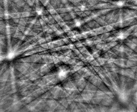 Experimental EBSD pattern from the mineral quartz, showing the multiple Kikuchi bands