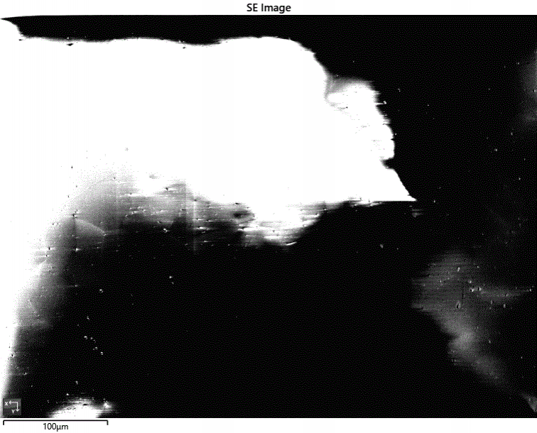 Secondary electron image of an uncoated Zirconia sample. Charging is causing instability and huge variations in the signal.